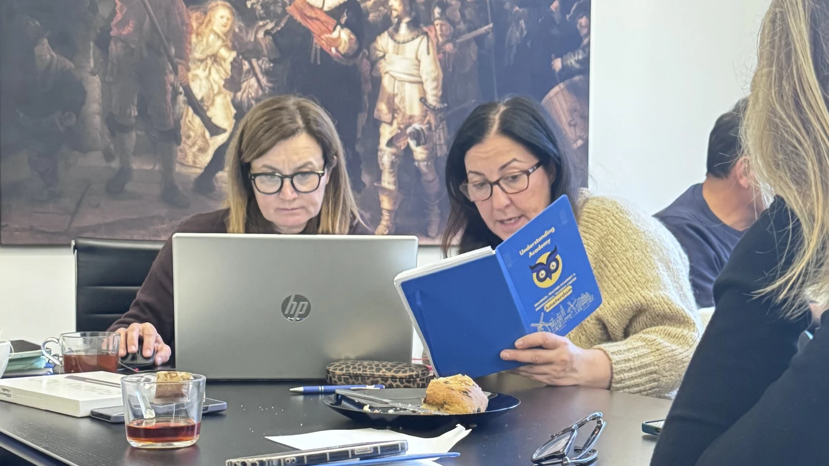 Educators using digital tools during a training course