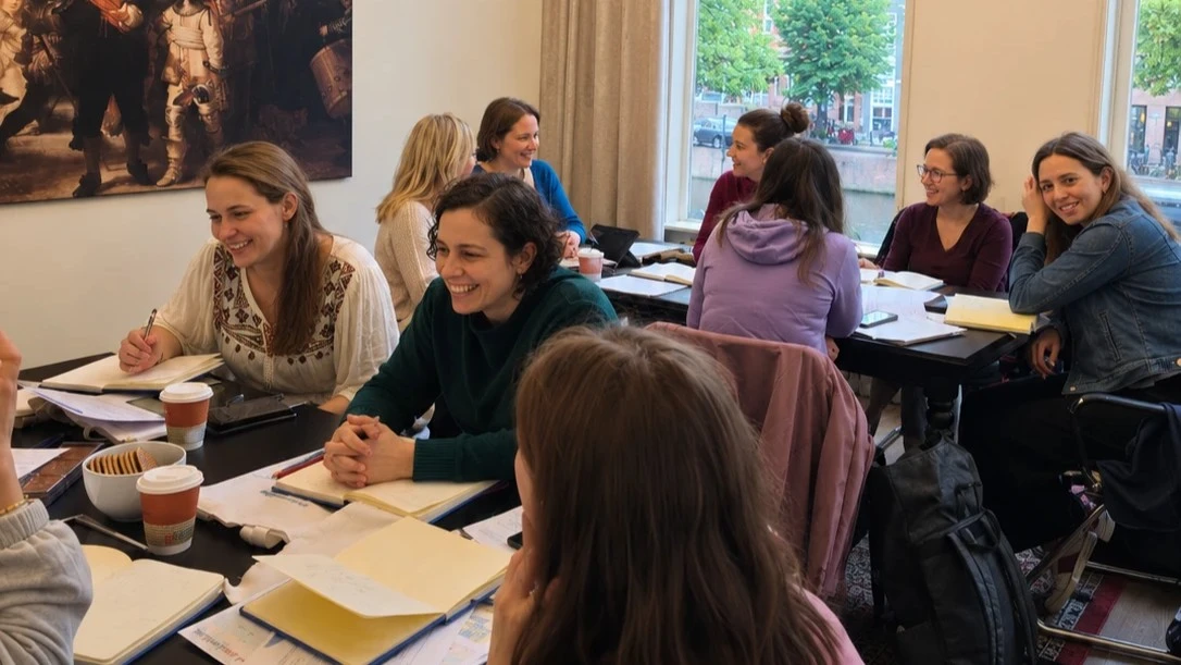 International education professionals participating in a classroom session